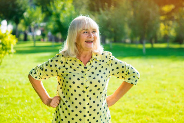 istock Woman smiling and looking aside. 1405688033