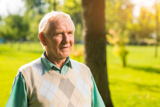 istock Old man outdoor. 1405688256