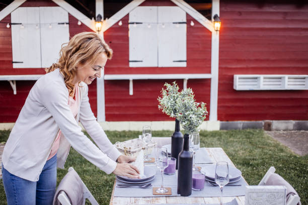 istock Woman serving outdoor party table 1405692313
