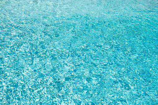 maldives swimming pool water background with ripples.