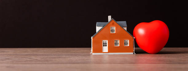 istock Red heart and miniature house 1405696091
