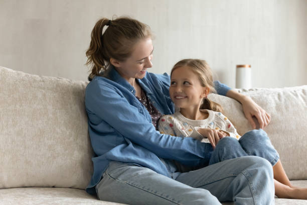 istock Happy young mother communicating with small kid. 1405696159