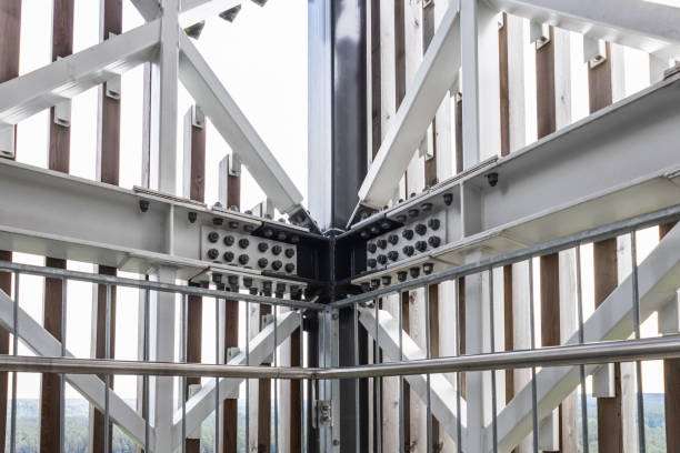 istock Massive industrial steel construction end-to-end with bolts and nuts on the construction 1405696244