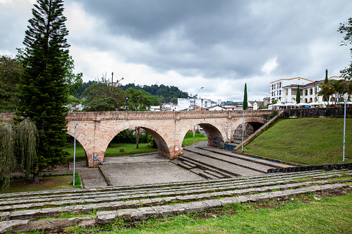 POPAYAN, COLOMBIA - MAY, 2022: Historical El Humilladero Bridge located at Popayan city center in Colombia
