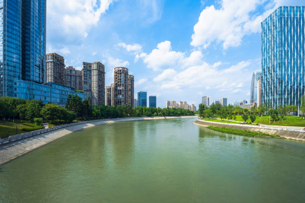 istock Sunny riverside bridge and Financial City 1405699289