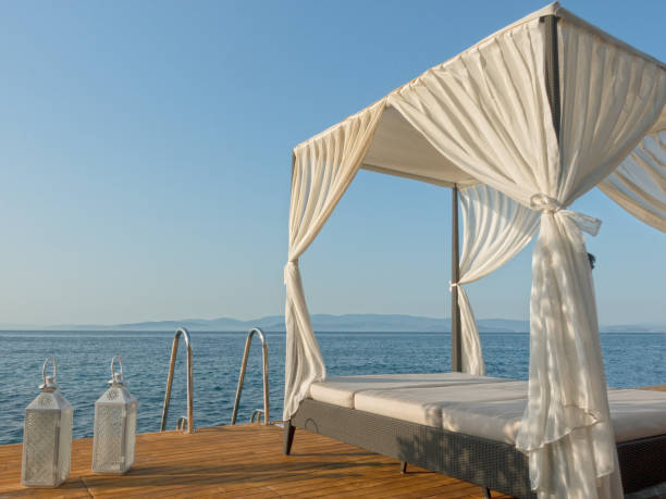 istock Seaside vacations lounge interior with gazebo 1405705079