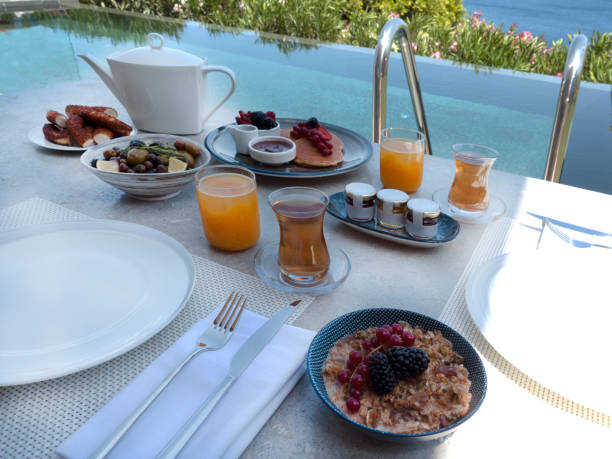istock Summer breakfast near swimming pool 1405705344
