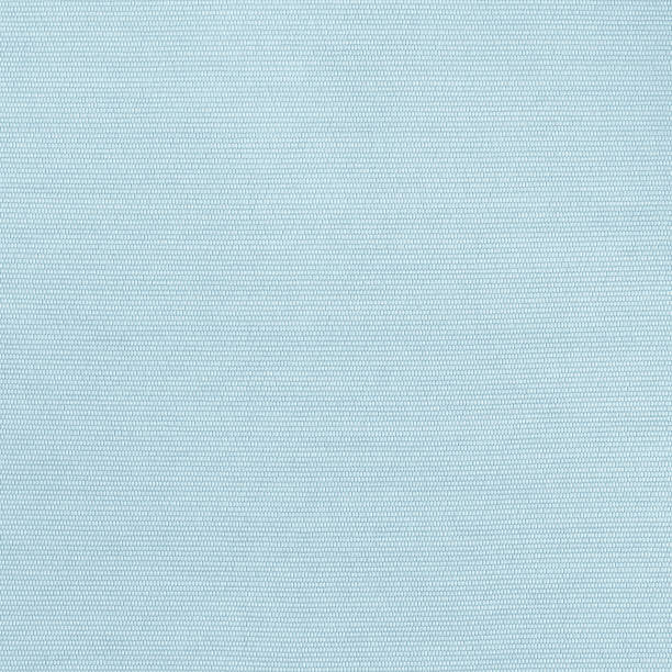 istock Woven cotton linen fabric textile textured backdrop in pastel light blue green color 1405709401