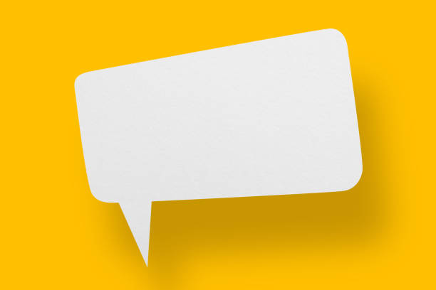 istock White paper in speech bubble shape set against yellow background. 1405716784