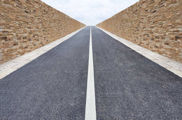 istock A straight road leads into the distance 1405721595