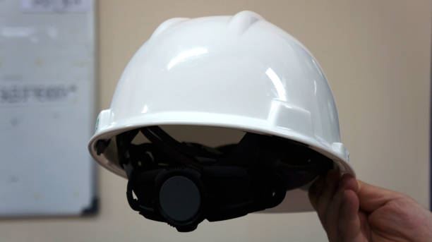 istock A white safety helmet to protect workers' heads from work accidents 1405725177