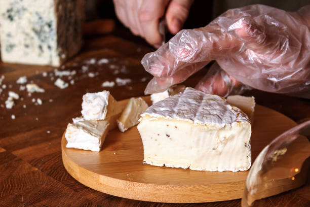 istock Cheese shop. Camembert. Selective focus. Close up. 1405727999