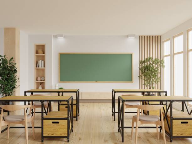 istock Classroom with school desks and greenboard,empty school classroom. 1405728042