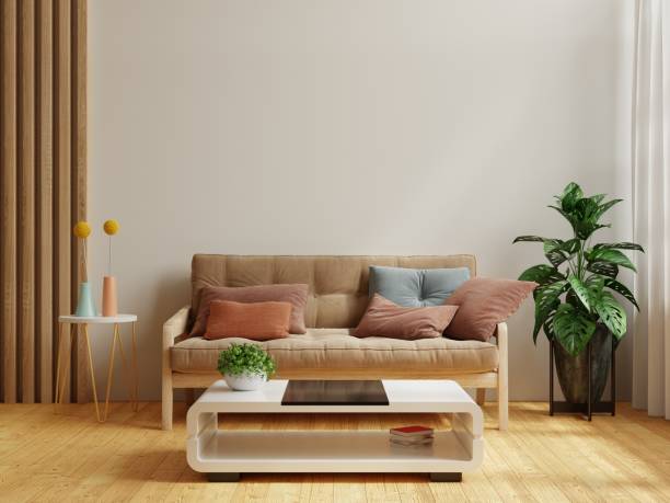 istock Interior wall mockup with empty white wall have brown sofa and plant in living room. 1405728066