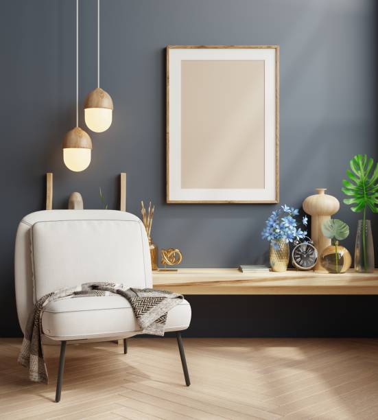 istock Mock up poster frame in modern interior with armchair on dark blue wall background. 1405728085