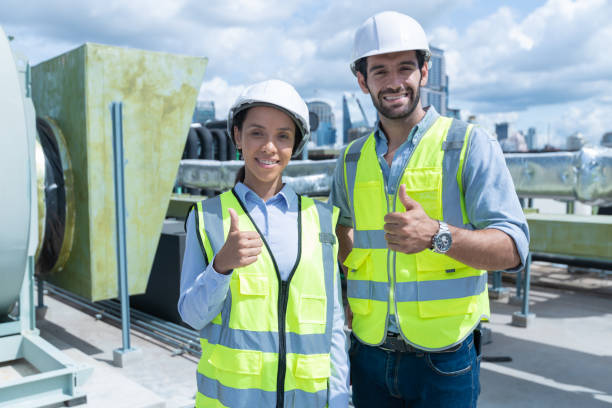 istock Engineer under checking the industry chilled water fan coil unit air conditioner is water cooling tower air chiller HVAC system of large industrial building to control air system 1405728091