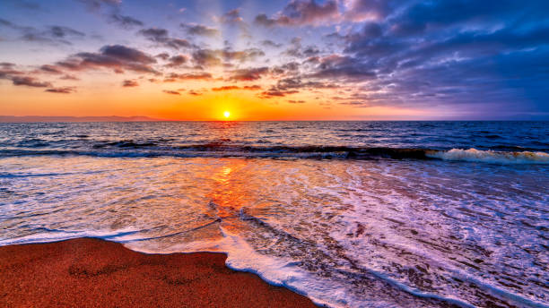 Sunset Ocean Tropical Beach Inspirational Sunrise Vacation 16.9 stock photo