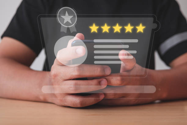 istock Human Resource Manager uses smartphone to find the best person for a work. Medium close up shot with virtual screen. 1405730281