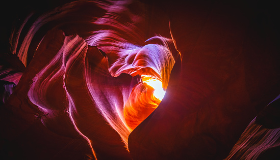 Glowing red heart shaped walls inside the Antelope Slot Canyon in Page, Arizona, United States.