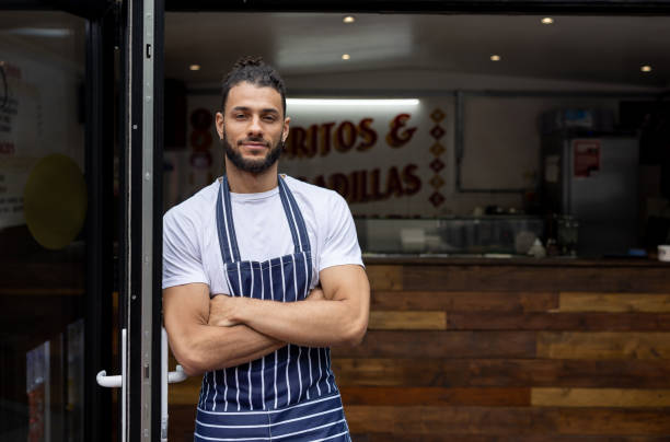 istock Waiter working at a small Mexican restaurant 1405734566