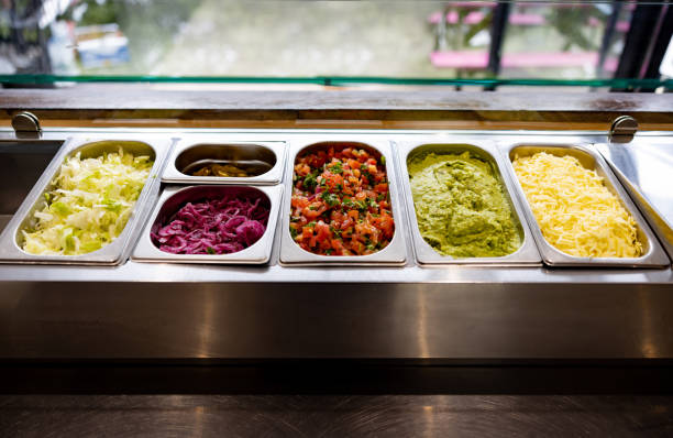 istock Close-up on some tacos ingredients at a Mexican restaurant 1405734568