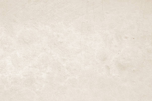 istock Old concrete wall texture background. Close up retro plain beige color cement material surface rough for show or advertise promote product content on display and brown paper design element concept. 1405735783
