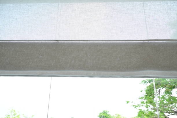 istock white curtain in the room, garden view 1405737125