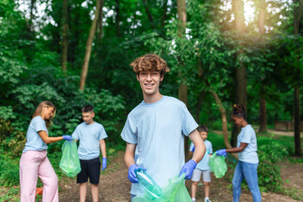istock Recycle waste litter rubbish garbage trash junk clean training. Nature cleaning, volunteer ecology green concept.Environment plastic pollution. 1405737880