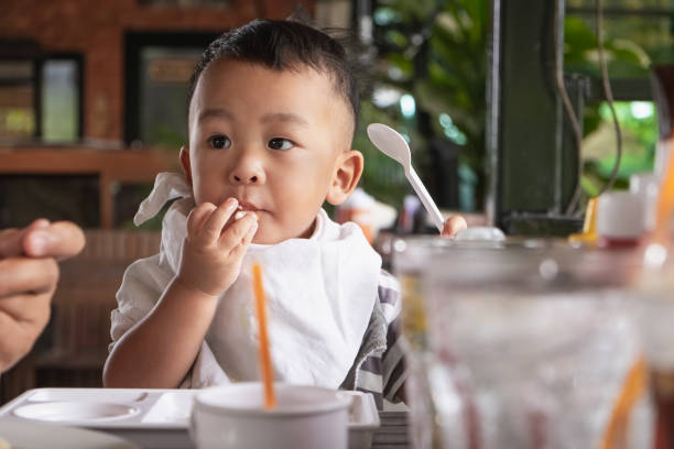 istock Baby boy love meal time 1405737995