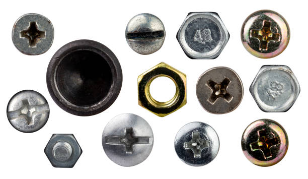 têtes de vis, écrous et rivets isolés sur fond blanc - screw wrench photos et images de collection