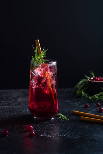 istock Cranberry drink with ice, decorated with rosemary. 1405742361