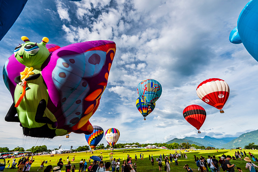 Taitung, Taiwan- July 6, 2019: Tourists are visiting the Taiwan international balloon festival at Luye highland in Taitung.