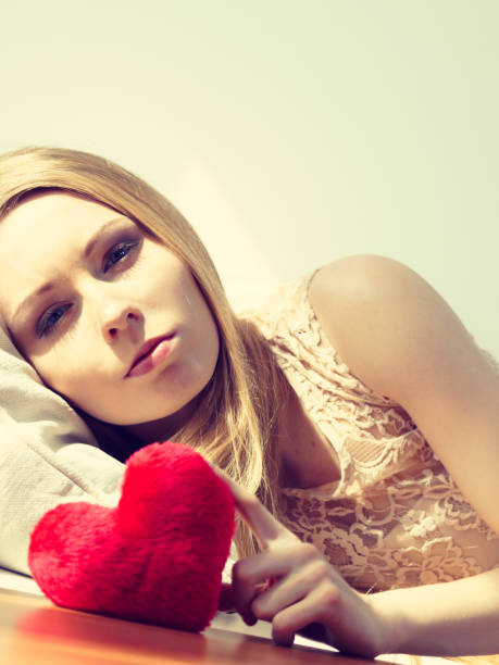 istock Sad woman on Valentines day 1405753466