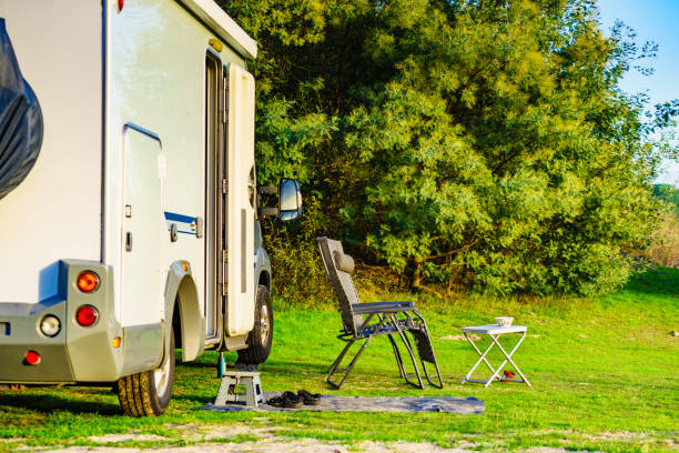 istock Rv caravan camping on green nature 1405753572