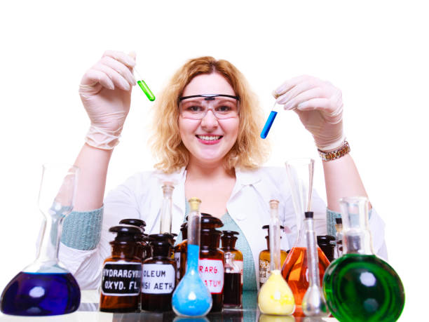 istock Chemist woman holds test flask 1405753679