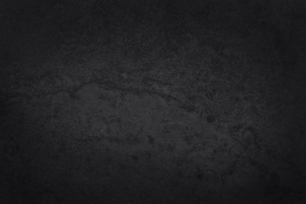 istock Dark grey black slate texture in natural pattern with high resolution for background and design art work. Black stone wall. 1405754988