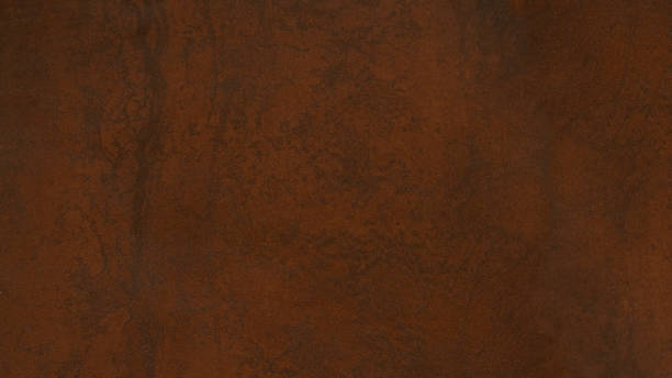 istock Grunge rusty orange brown metal steel stone corten rust wall texture background 1405759229