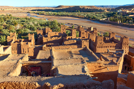 Towers of Kasbah Ait Ben Haddou in the Atlas Mountains at sunset, Morocco
