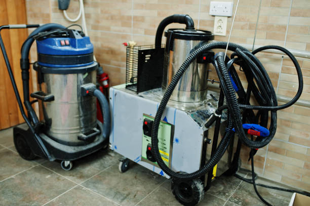 istock Professional vacuum cleaner at car detailing garage. 1405765264