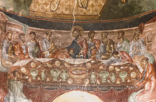 Georgia - June 29, 2022: Ancient fresco Last Supper in basilica of Ubis monastery, XIV century.