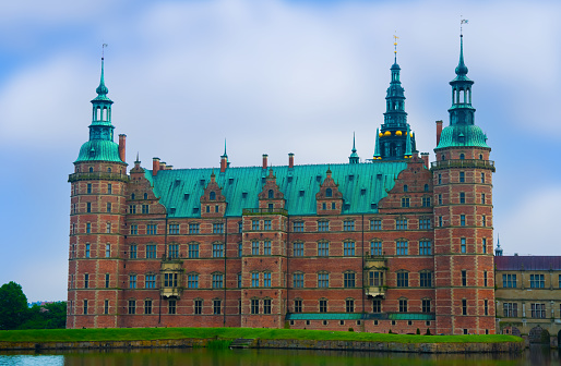Hillerød, Denmark - June 26th 2022: View of Frederiksborg castle on a summers day.