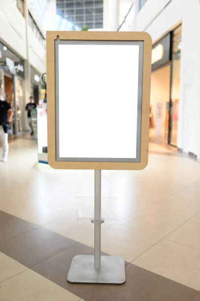 istock blank sign with copy space for your text message or mock up content in modern shopping mall 1405770565