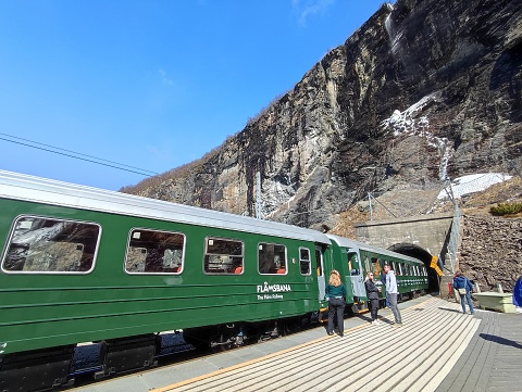 Myrdal, Norway: 3 May 2022 - Flam railway train at Kjosfossen station