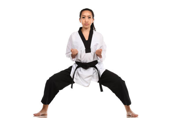 фонды тхэквондо - martial arts women tae kwon do black belt стоковые фото и изображения