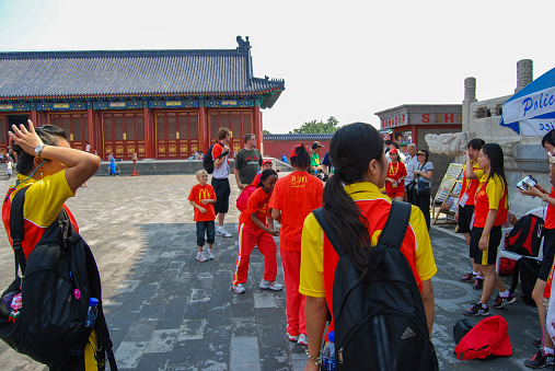Beijing, China- August 24, 2008: During the Beijing 2008 Olympics time, many tourists came to the landmark place- the Temple of Heaven. Here is a tourist group.