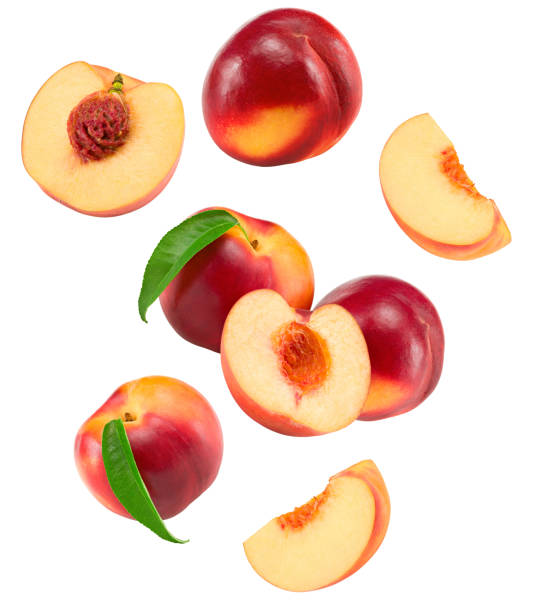 istock Nectarine with green leaf and slices isolated on white background. clipping path 1405774872