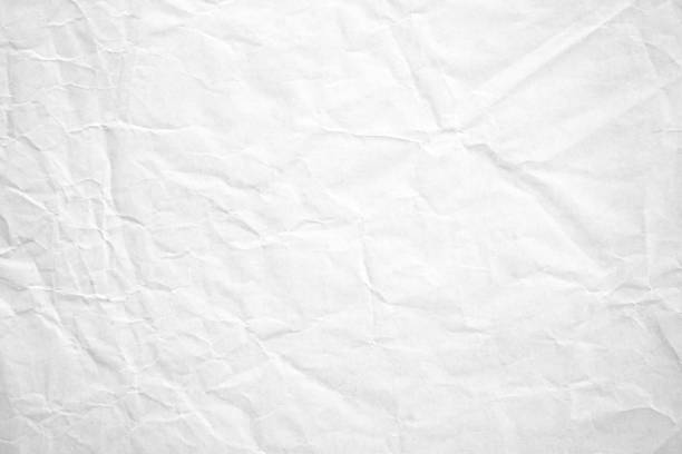 istock White crumpled recycle paper background 1405775375