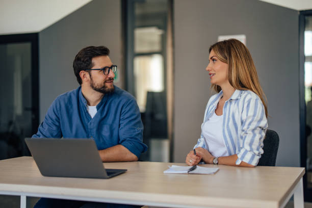 istock Business people working together at the office. 1405776408