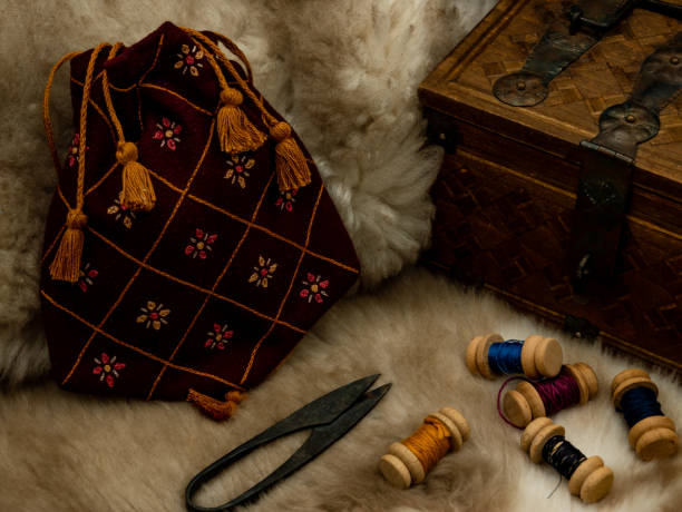 istock sewing set with spools of wool scissors and a cloth bag on a fur 1405777253