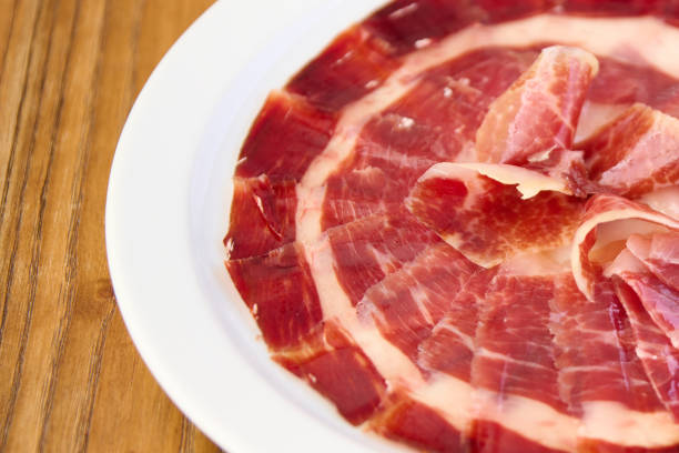 istock plate with sliced Iberian ham 1405781426
